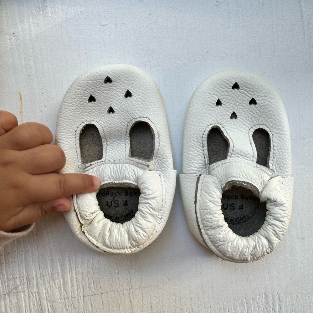 Beautifully soft white baby moccs 🤍